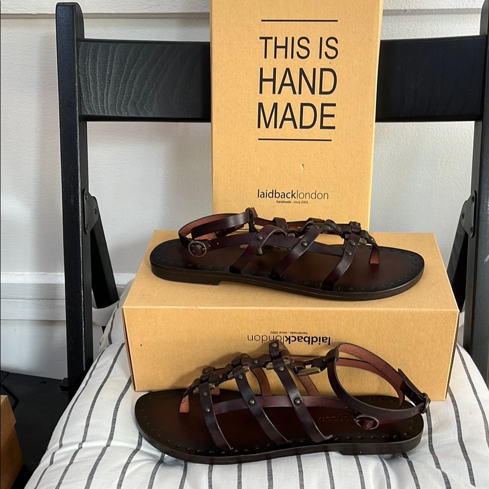 Women’s leather strappy sandals .